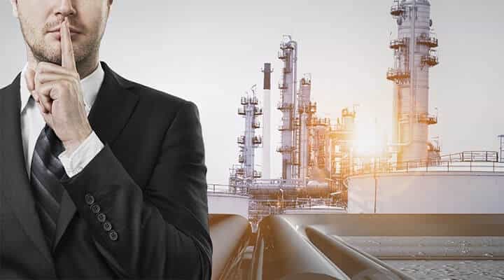 Man motioning to be quiet